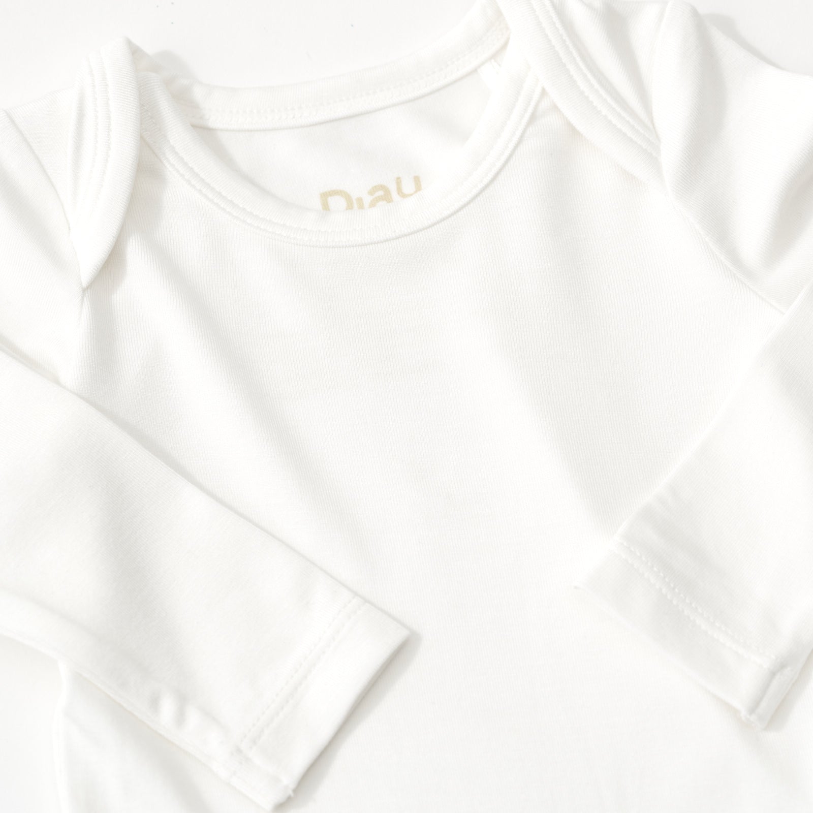 Soft White Long Sleeve Bodysuit