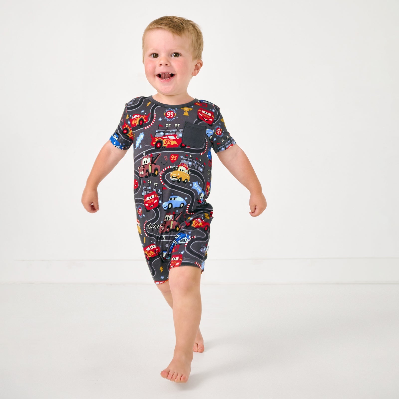 Disney & Pixar Piston Cup Pocket Shorty Romper
