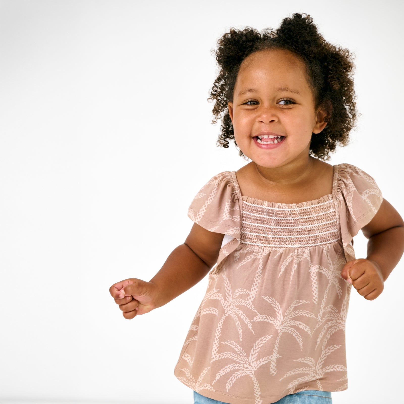 Sandy Palms Smocked Flutter Top
